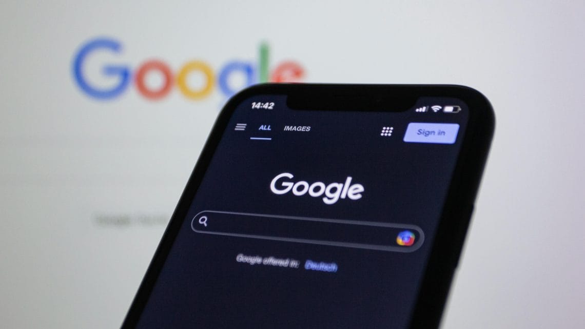 Closeup of a google search page on mobile phone